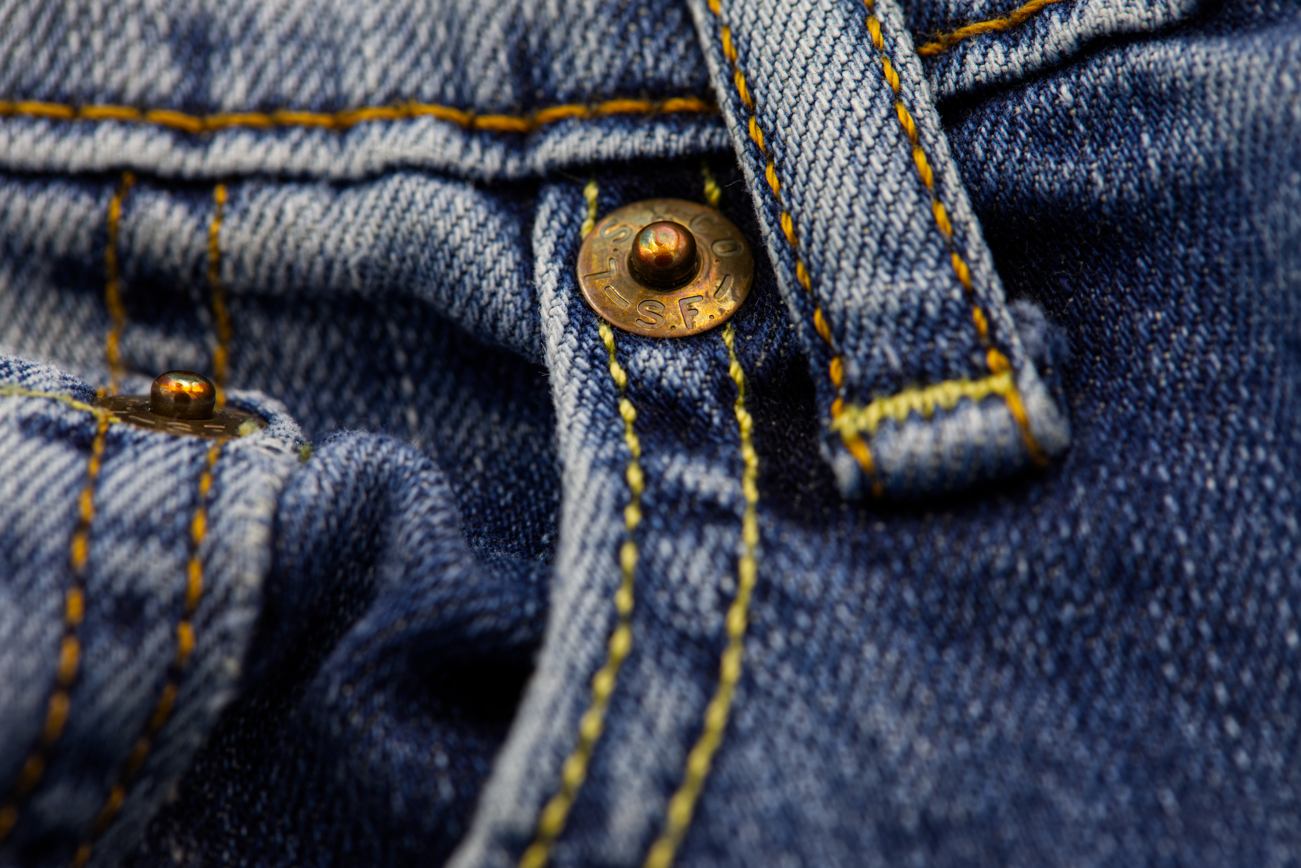 Detail of a pair of worn blue jeans in Phoenix, May 11, 2026.