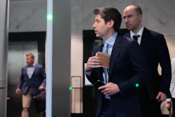 Sam Altman, center, and OpenAI president Greg Brockman, right, arrive at the U.S. District Court in Oakland, Calif., Thursday, April 30, 2026.