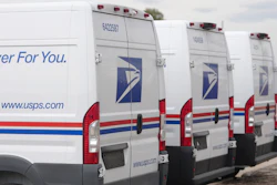 USPS delivery vans in Denver, March 23, 2026.