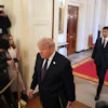 President Donald Trump and Kevin Warsh arrive at Warsh's swearing-in ceremony as Fed chair, May 22, 2026.
