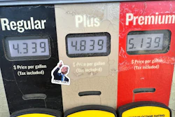 A sticker with the image of President Trump points to per-gallon prices for gasoline at a Conoco station in Denver, May 30, 2026.