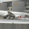 A Lufthansa 'Dreamliner ' aircraft lies on its nose in front of a terminal at Frankfurt Airport after the nose landing gear collapsed on Thursday, June 4, 2026 in Frankfurt, Germany.