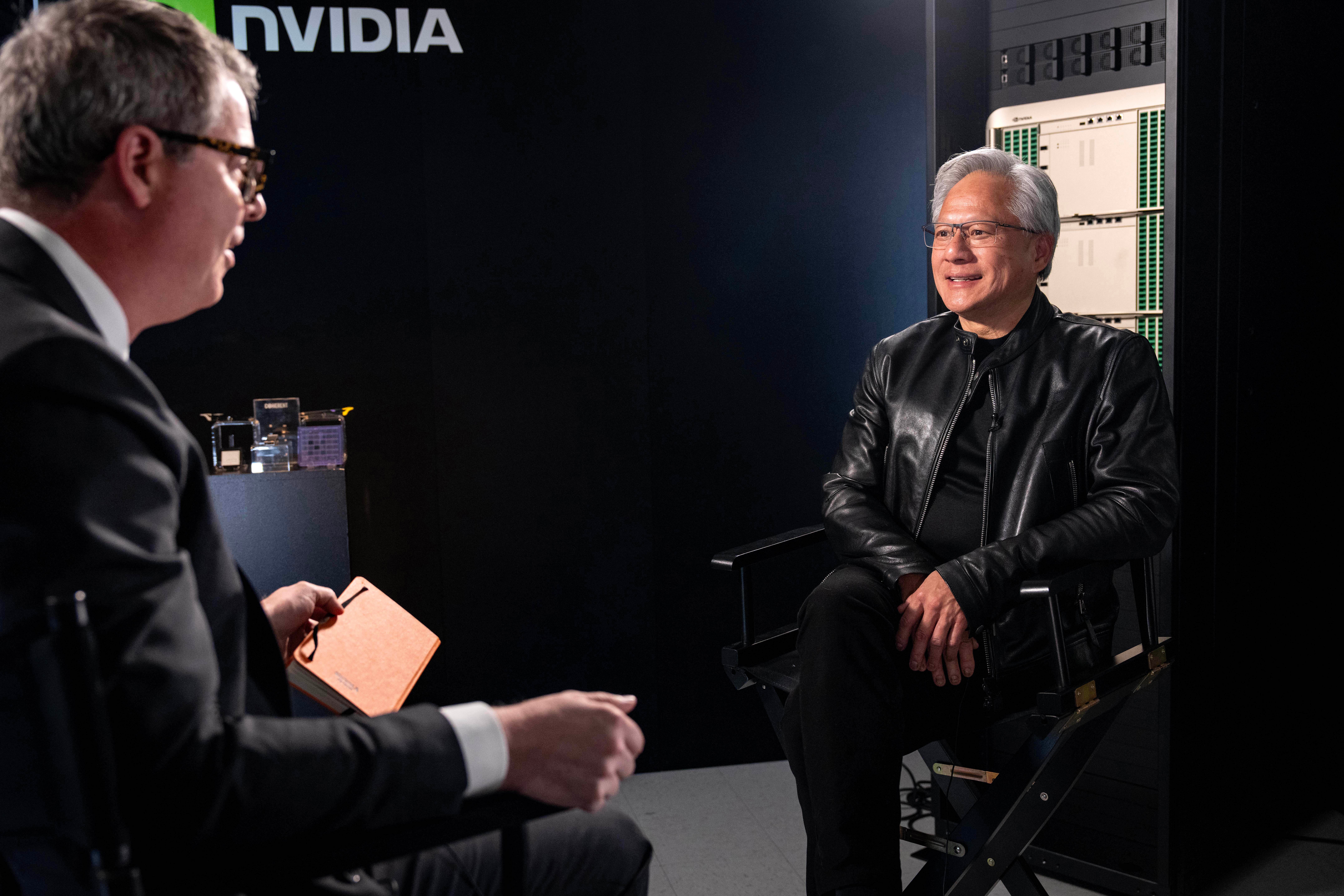 Jensen Huang, president and CEO of Nvidia, listens during an interview before a groundbreaking ceremony for an expansion of Coherent's manufacturing facility on Tuesday, June 16, 2026, in Sherman, Texas.