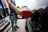 A customer readies to pump gas at this Ridgeland, Miss., Costco, Tuesday, May 24, 2022.
