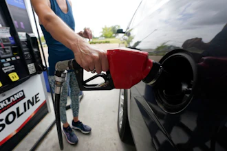 A customer readies to pump gas at this Ridgeland, Miss., Costco, Tuesday, May 24, 2022.