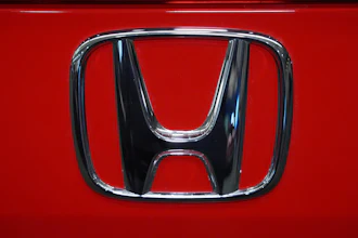 This is the Honda logo on a Honda Civic Sport Touring automobile on display at the Pittsburgh International Auto Show in Pittsburgh, Feb. 14, 2025.