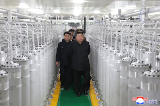 In this photo provided by the North Korean government, its leader Kim Jong Un, front right, visits a new facility to produce nuclear bomb fuels at an undisclosed place in North Korea Wednesday, June 3, 2026. Independent journalists were not given access to cover the event depicted in this image distributed by the North Korean government. The content of this image is as provided and cannot be independently verified. Korean language watermark on image as provided by source reads: 'KCNA' which is the abbreviation for Korean Central News Agency.