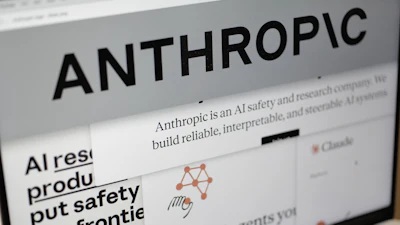 Pages from the Anthropic website and the company's logo are displayed on a computer screen in New York, Feb. 26, 2026.