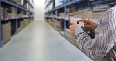 Businessman Stock Room Tablet 000063269441 Large