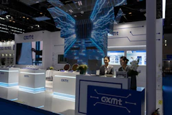 Workers at the booth for Chinese DRAM producer ChangXin Memory Technologies, also known as CXMT, wait for visitors at the 21st China International Semiconductor Expo in Beijing, Nov. 20, 2024.