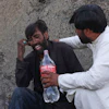 A man comforts a miner mourning fellow miners killed in an explosion at a coal mine on the outskirts of Quetta, in southwest Pakistan, Thursday, July 30, 2026.