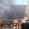 In this photo released by Xinhua News Agency, firefighters at the scene of a footwear factory fire in Jiangtou village, Chendai township of Jinjiang city, southeastern China's Fujian province, Thursday, July 9, 2026.