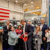 Jörg Stratmann, CEO of Rolls-Royce Power Systems, and Najwa Massad, Mayor of Mankato, at the opening of Rolls-Royce's new Logistics Operations Center in Mankato, USA. Representatives from politics, business, and the company were present for the official inauguration of the $24 million expansion.