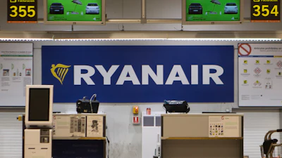 The Ryanair desk is seen, Aug. 10, 2018, at the Barajas airport in Madrid, Spain.