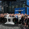 SpaceX employees celebrate during a closing bell ceremony for the IPO of SpaceX at the Nasdaq MarketSite in New York, Friday, June 12, 2026, in New York.