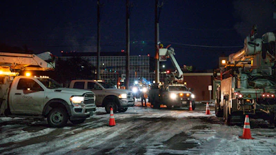 An Oncor Electric Delivery lineman crew work on repairing a utility pole that was damaged by the winter storm that passed through Odessa, Texas, Feb. 18, 2021.