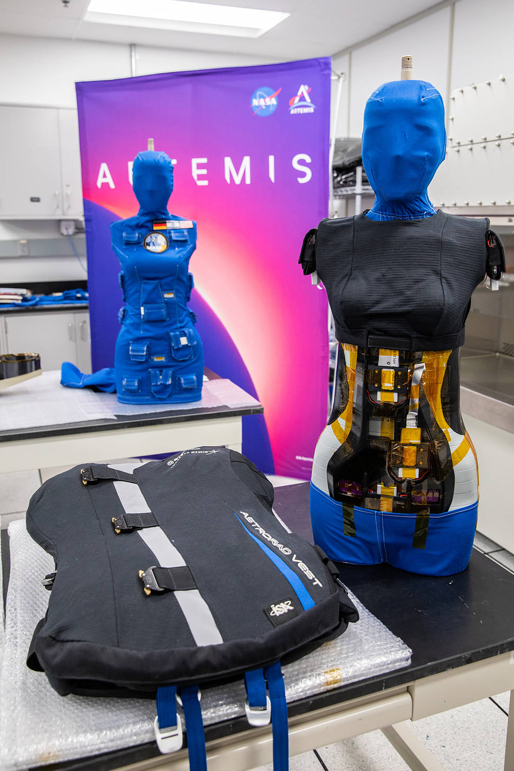 In this photo provided by NASA, Helga and Zohar, two female manikins in the Matroshka AstroRad Radiation Experiment investigation, undergo post-flight payload inspections, Jan. 17, 2023, inside the Space Station Processing Facility at Kennedy Space Center on Merritt Island, Florida.