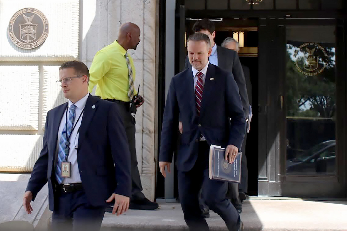 United States Trade Representative Jamieson Greer, center, leaves the U.S. Department of Commerce following a meeting with Canadian officials, Aug. 17, 2026.