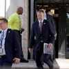 United States Trade Representative Jamieson Greer, center, leaves the U.S. Department of Commerce following a meeting with Canadian officials, Aug. 17, 2026.