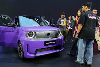 Visitors examine a Honda Super-One EV during the Indonesia International Auto Show organized by the Association of Indonesian Automotive Industries (GAIKINDO) in Tangerang, Indonesia, Thursday, July 30, 2026.