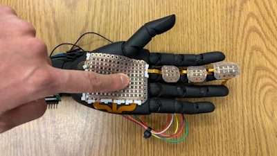 A robotic hand fitted with 3D-printed sensor module developed by the research team from Washington State University. The electronic skin can detect pressure and temperature at a fine level, laying the groundwork for bionic skin that could be used on prosthetics to help amputees and others.