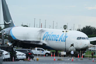Workers inspect an Amazon cargo plane that overshot a runway four days ago at Miami International Airport, Thursday, Sept. 10, 2026, in Miami.