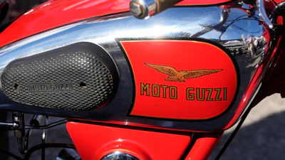 A vintage Moto Guzzi motorcycle is displayed during the Moto Guzzi opening inaugurating its completely redeveloped historic factory and new museum as the motorcycle maker celebrates its 105th anniversary, in Mandello del Lario, Thursday, Sept. 3, 2026.