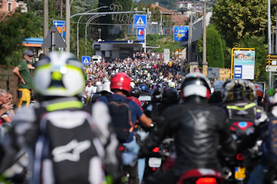 Guzzi bikers run during the Grand Parade in Mandello del Lario on Lake Como, part of the Moto Guzzi World Days 2026, as the maker celebrates its 105th anniversary, in Lecco, Italy, Saturday, Sept. 5, 2026.