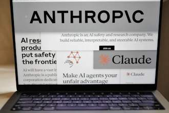 Pages from the Anthropic website and the company's logos are displayed on a computer screen in New York, Feb. 26, 2026.