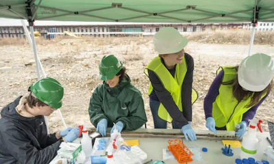 From left, first-year student Charlie Stanczek, lab manager Mara Kessler, professor Catherine Armbruster and second-year Ph.D. student Betsy Lewis work on soil samples.