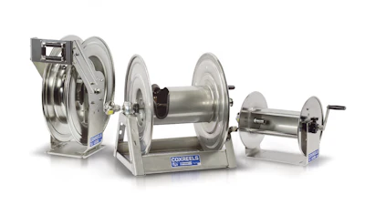 Three stainless steel industrial hose reels of different sizes with manual crank handles