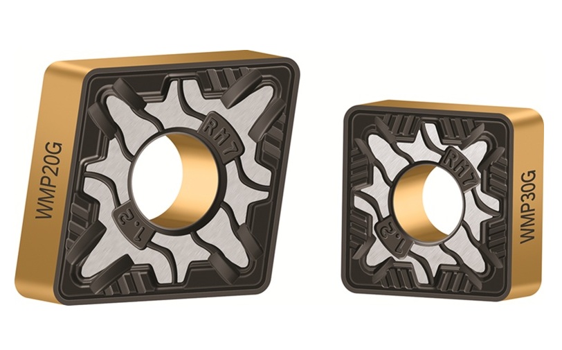 Two square carbide cutting inserts with gold coating and technical markings WMP20G and WMP30G