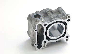 Aluminum engine cylinder head with circular bore opening and mounting bolt holes