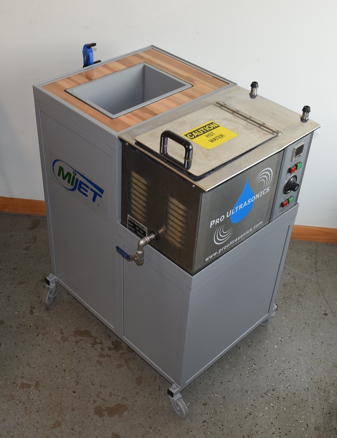 Industrial ultrasonic cleaning machine with wooden top basin and control panel featuring MIET and Pro Ultrasonics branding