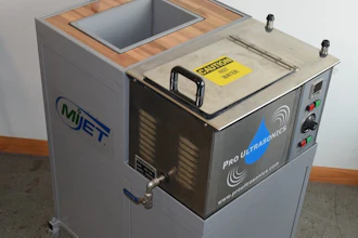 Industrial ultrasonic cleaning machine with wooden top basin and control panel featuring MIET and Pro Ultrasonics branding