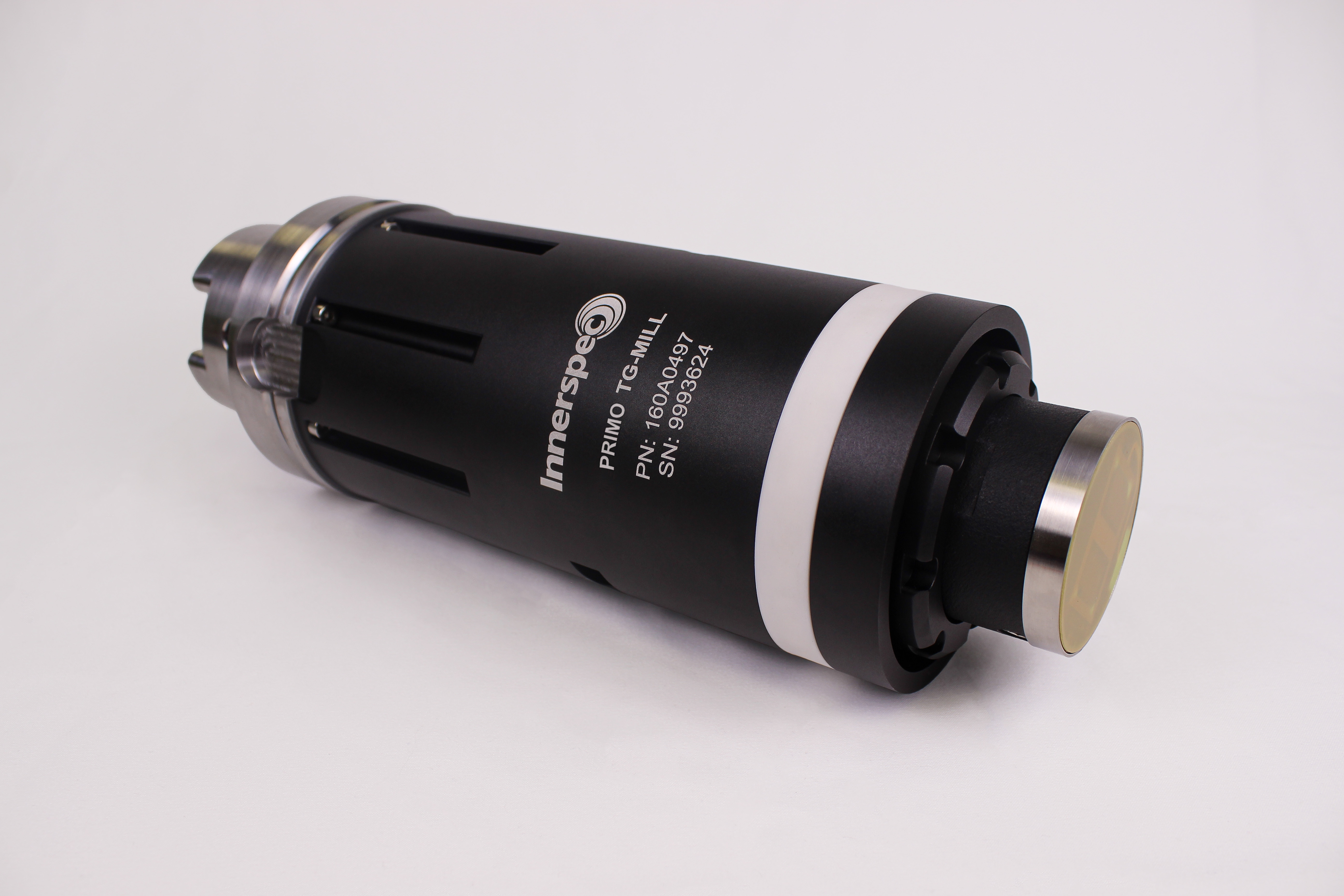 Black cylindrical thermal imaging camera with white text and metallic end caps