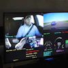 Multi-camera dashcam display showing driver, road view, and vehicle telemetry data with speed and performance metrics