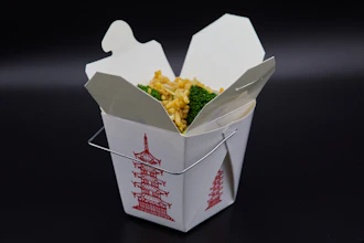 A Chinese takeout container with fried rice inside is photographed in Phoenix, May 12, 2026.