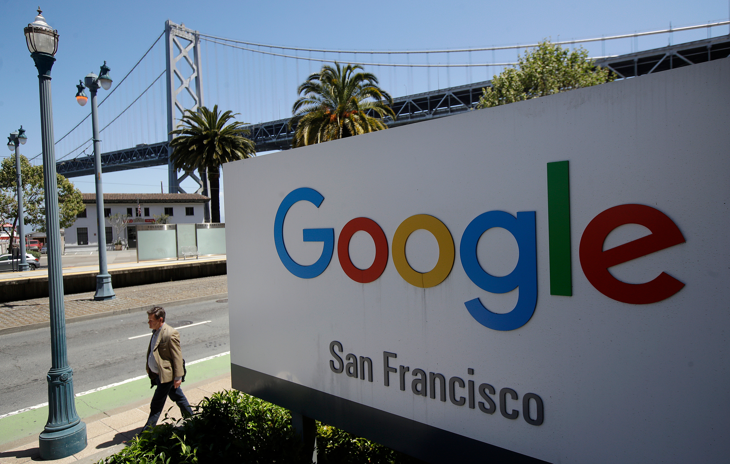 Google San Francisco sign with Bay Bridge visible in background