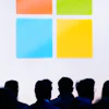 Microsoft logo featuring four colored squares in orange, green, blue, and yellow arranged in a grid pattern