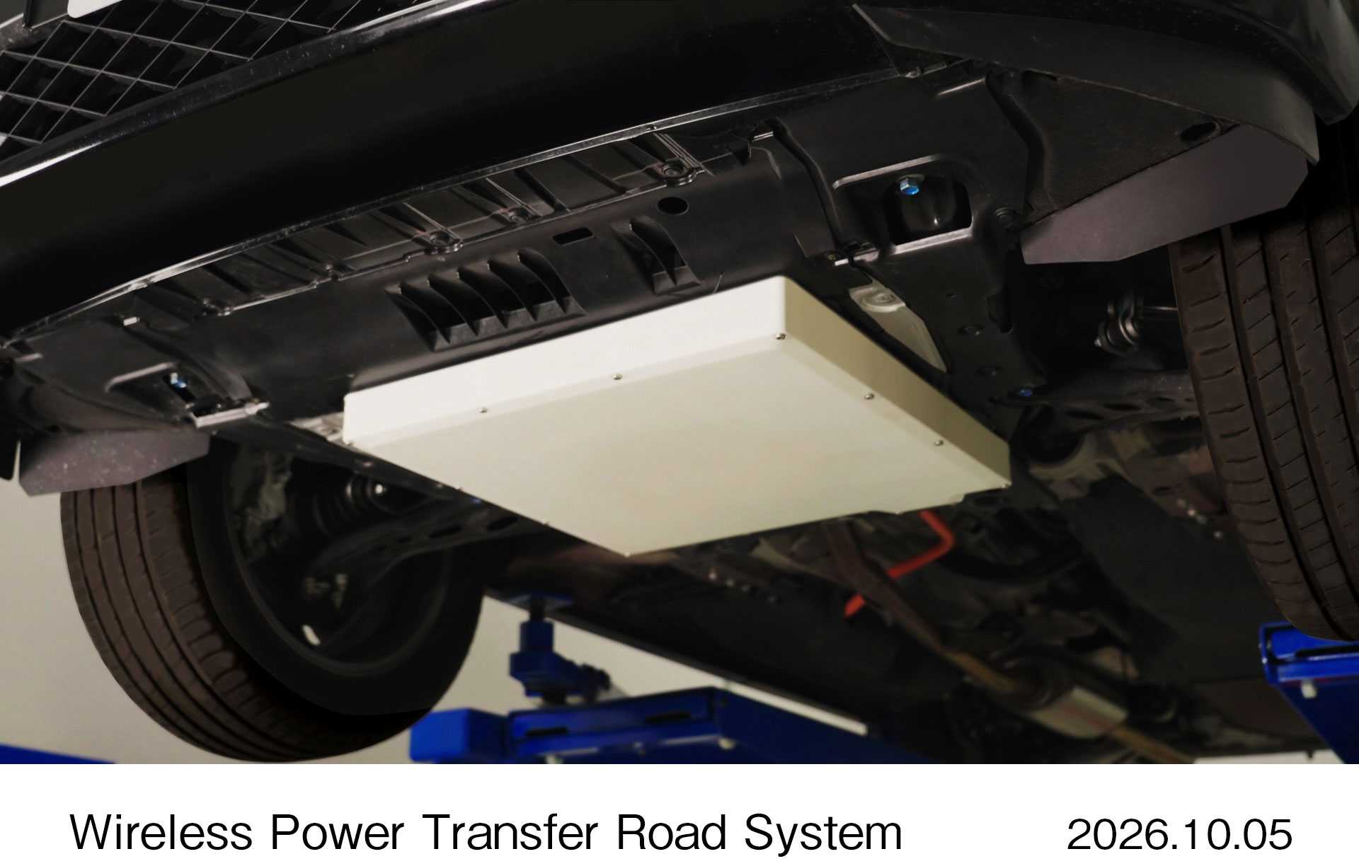 Wireless power transfer charging system installed under vehicle chassis with illuminated receiver panel