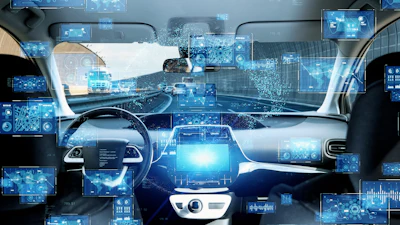 Futuristic car interior with digital dashboard displays and blue holographic interface elements representing autonomous vehicle technology