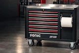 Sonic S19 tool chest with red and black drawers, stainless steel top, and paper towel holder on casters