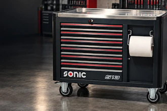 Sonic S19 tool chest with red and black drawers, stainless steel top, and paper towel holder on casters