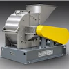 Munson industrial material processing machine with silver drum mixer and yellow feed hopper