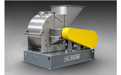 Munson industrial material processing machine with silver drum mixer and yellow feed hopper