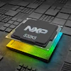 NXP S32K5 microprocessor chip on illuminated circuit board with geometric patterns