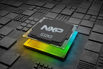NXP S32K5 microprocessor chip on illuminated circuit board with geometric patterns