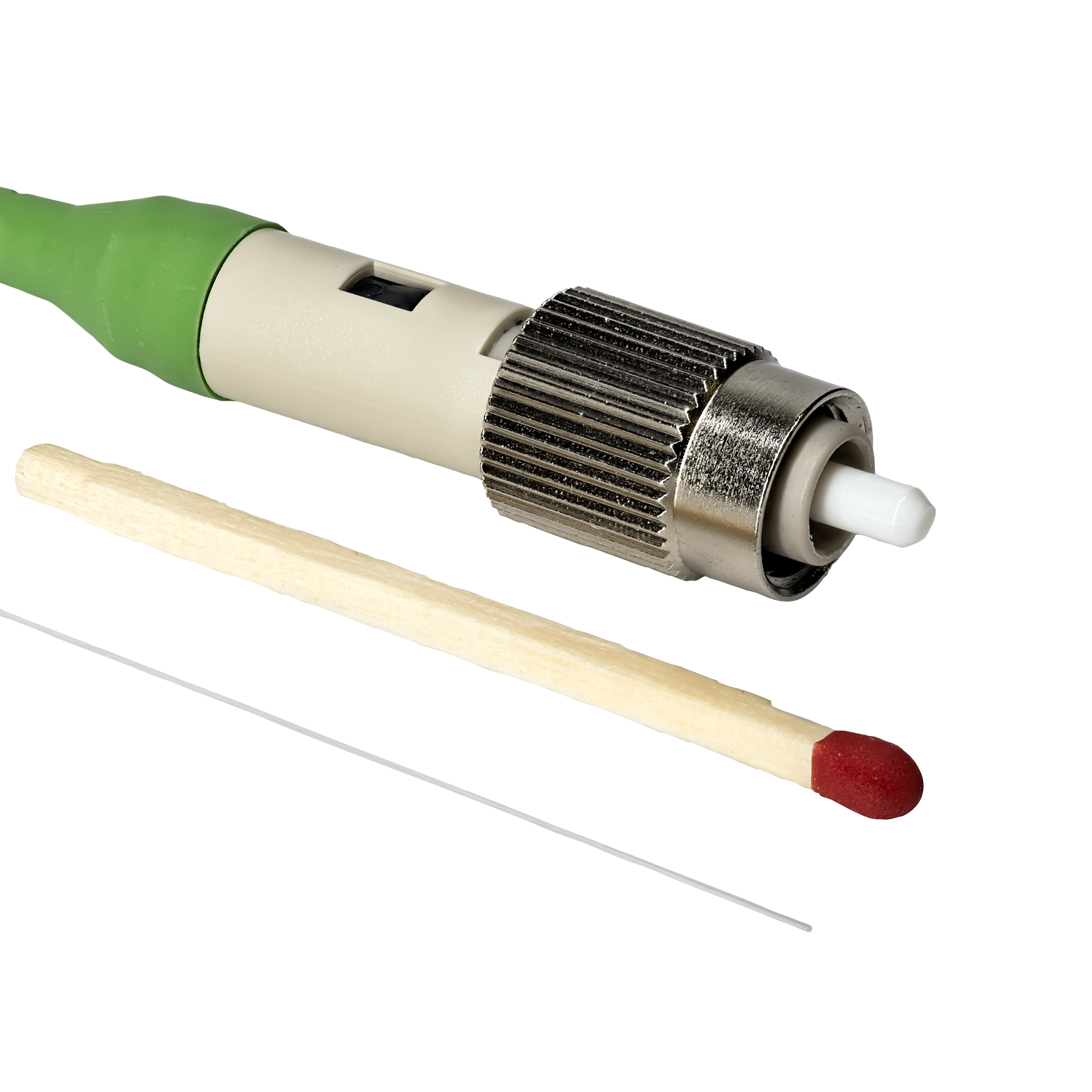 Fiber optic connector with green cable, metallic coupling nut, and ceramic ferrule tip displayed with applicator tools